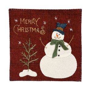 wool table centerpiece featuring a snowman, Christmas tree, and the words Merry Christmas
