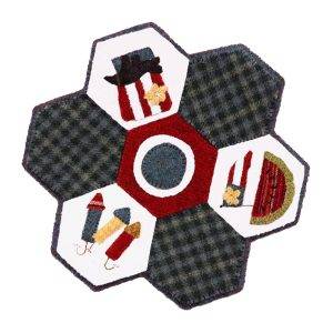 wool tabletop centerpiece or candle mat featuring a patriotic theme including fireworks, an Uncle Sam hat, and watermelon with red, white, and blue fabrics