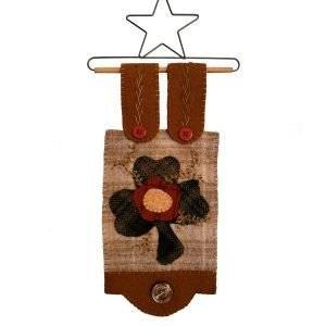Three leaf clover themed door hanger home decor made in the USA using 100% wool fabrics and hand embroidery.