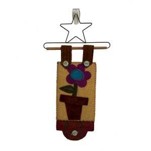 Hand embroidered wool fabric door hanger of a potted purple flower with accent buttons