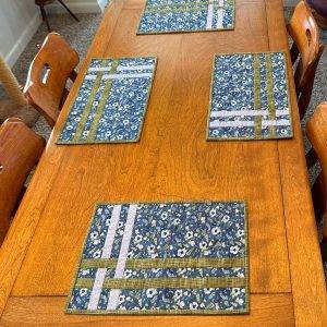 Our Blue Floral placemats on a dining room table