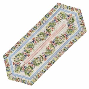 Long table runner with a vibrant pattern of various wildflowers in different sizes and colors on a light background. Measures 16x40 inches.