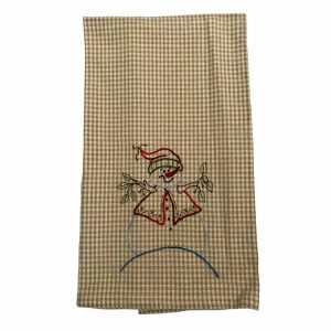Cotton tea towel with a cheerful embroidered snowman wearing a hat, scarf, and mittens on a tan and white plaid background. Measures 18x28 inches.