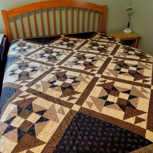"Classic Black & Tan" Bed Quilt 82 x 82, black, brown, tan and navy blue fabric squares sewn together