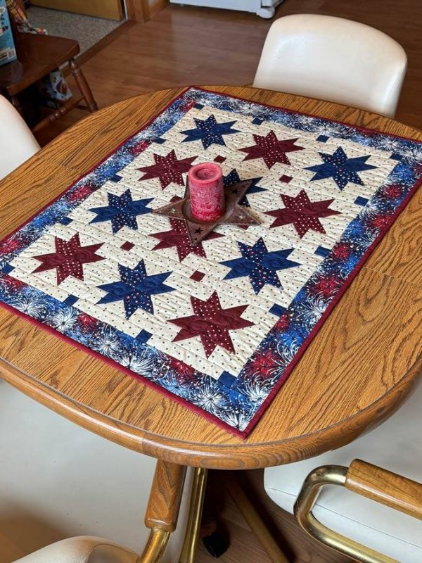 Red, white, and blue "Patriotic" seasonal tabletop home decor table runner in use
